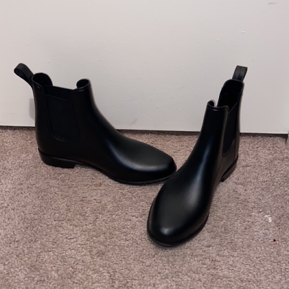 Black rain boots.